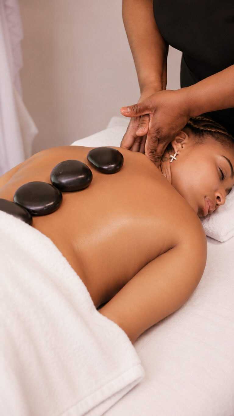 Hot stone massage relaxing client